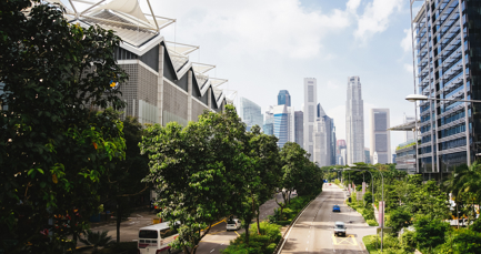 How can reducing nitrogen dioxide in UK cities benefit the economy?